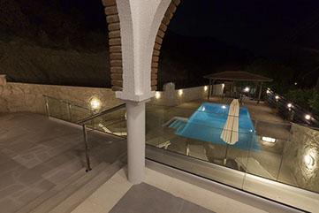 View of Heaven's edge Balcony and Pool by night